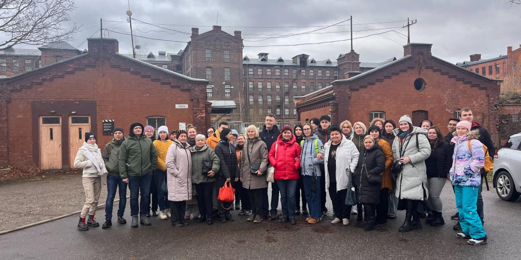 People standing infront of a building 